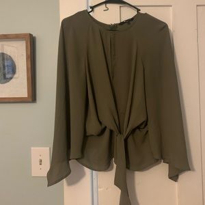 Sage green blouse with cutout detail and front tie, size small.